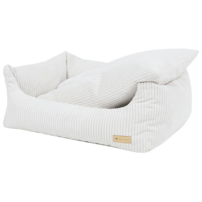 A cozy dog sofa bed with a pillow